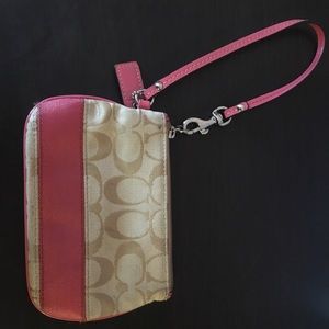 Coach pink leather wristlet, one zipper, pocket